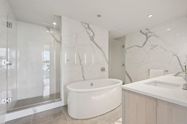Bathroom, Dual Sink Vanities, Glass Shower, Interior, Marble Walls, Recessed Lighting