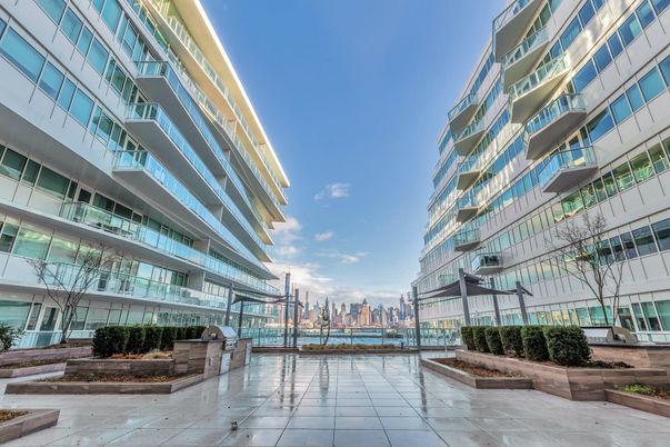 Exterior, Facade, Pool, Condo Building