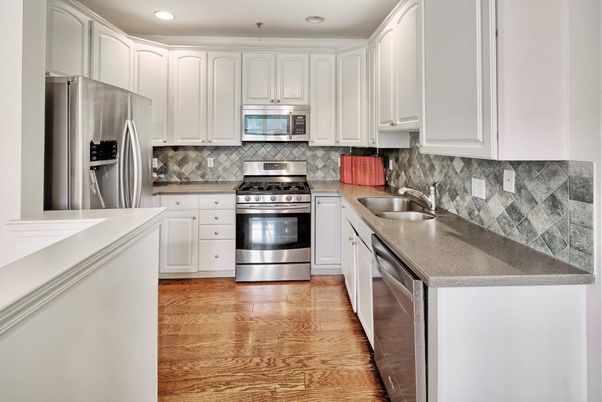 Interior, Kitchen, Recessed Lighting, Stainless Steel Appliances, Wood Texture Flooring