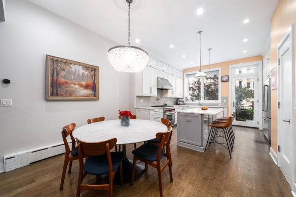 Chandelier, Dining room, Interior, Kitchen, Pendant Lights, Recessed Lighting, Stainless Steel Appliances, Wood Texture Flooring