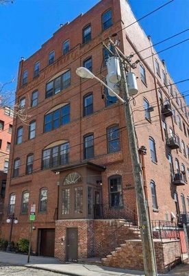 Exterior, Facade, Brick Facade, Condo Building