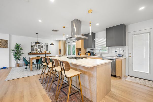 Dining room, Interior, Kitchen, Pendant Lights, Recessed Lighting, Stainless Steel Appliances, Wood Texture Flooring