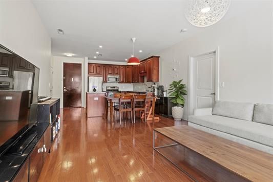 Dining room, Interior, Kitchen, Living room, Pendant Lights, Recessed Lighting, Stainless Steel Appliances, Wood Texture Flooring