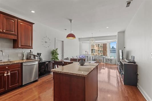 Dining room, Interior, Kitchen, Living room, Pendant Lights, Recessed Lighting, Stainless Steel Appliances, Wood Texture Flooring