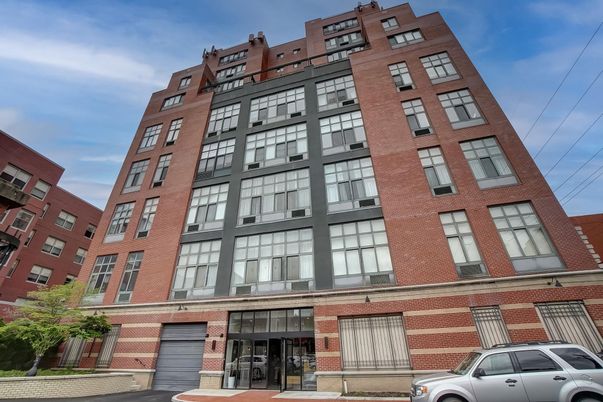 Exterior, Facade, Brick Facade, Condo Building