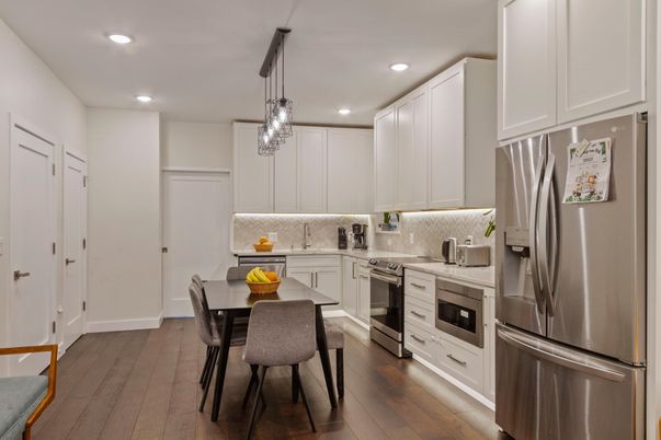 Dining room, Interior, Kitchen, Pendant Lights, Recessed Lighting, Stainless Steel Appliances, Wood Texture Flooring