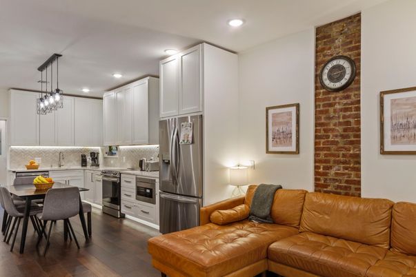 Dining room, Interior, Kitchen, Pendant Lights, Recessed Lighting, Stainless Steel Appliances, Stone Walls, Wood Texture Flooring