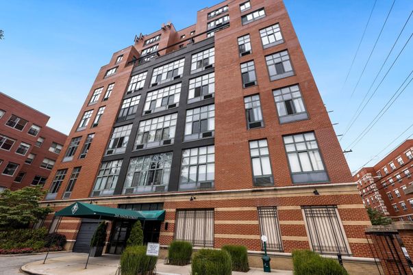 Exterior, Facade, Brick Facade, Condo Building