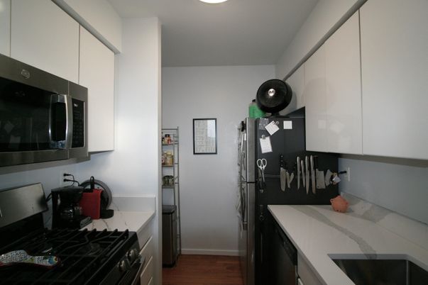 Interior, Kitchen, Tile Countertops, Wood Texture Flooring