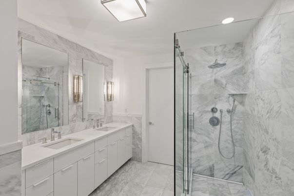 Bathroom, Dual Sink Vanities, Glass Shower, Interior, Marble, Marble Walls, Recessed Lighting