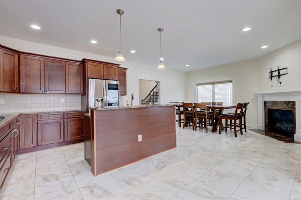 Dining room, Fireplace, Interior, Kitchen, Marble, Pendant Lights, Recessed Lighting, Stainless Steel Appliances