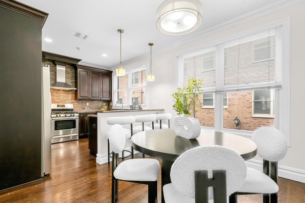 Dining room, Interior, Kitchen, Pendant Lights, Recessed Lighting, Stainless Steel Appliances, Wood Texture Flooring