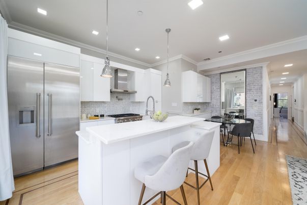 Dining room, Interior, Kitchen, Pendant Lights, Recessed Lighting, Stainless Steel Appliances, Stone Walls, Wood Texture Flooring