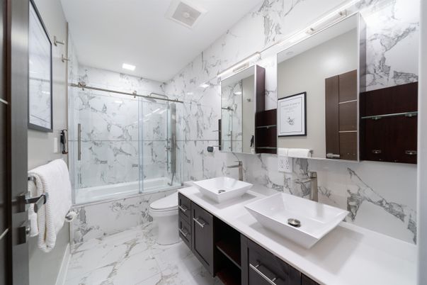 Bathroom, Dual Sink Vanities, Glass Shower, Interior, Marble, Marble Walls, Recessed Lighting