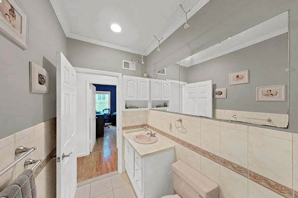 Bathroom, Dual Sink Vanities, Interior, Recessed Lighting, Wood Texture Flooring
