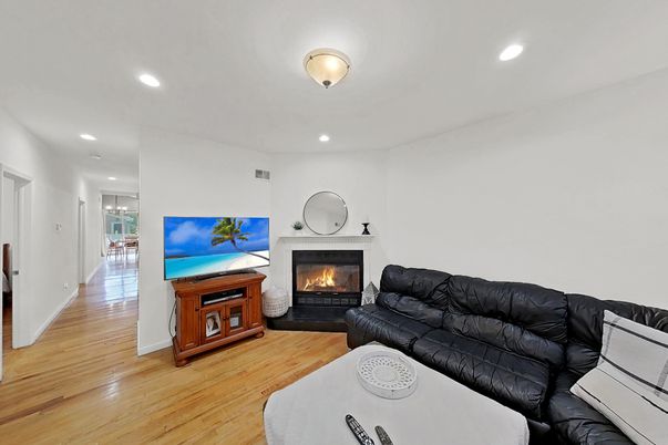Fireplace, Interior, Living room, Recessed Lighting, Wood Texture Flooring