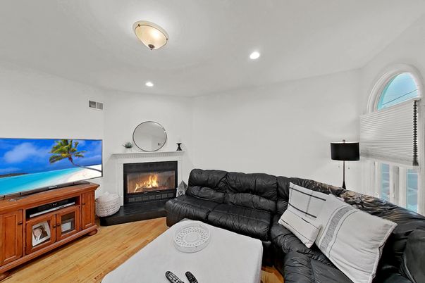 Fireplace, Interior, Living room, Recessed Lighting, Wood Texture Flooring
