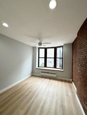 Empty room, Interior, Recessed Lighting, Stone Walls, Wood Texture Flooring