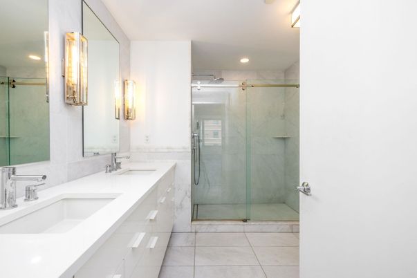 Bathroom, Dual Sink Vanities, Glass Shower, Interior, Marble Walls, Recessed Lighting