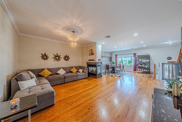 Chandelier, Dining room, Fireplace, Interior, Living room, Recessed Lighting, Wood Texture Flooring
