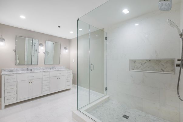 Bathroom, Dual Sink Vanities, Glass Shower, Interior, Marble, Marble Walls, Recessed Lighting