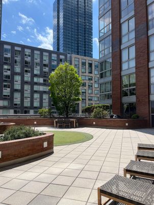 Exterior, Facade, Brick Facade, Condo Building