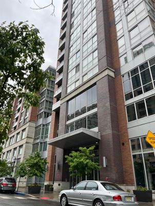 Exterior, Facade, Brick Facade, Condo Building