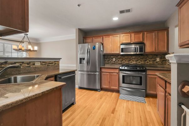 Interior, Kitchen, Pendant Lights, Recessed Lighting, Stainless Steel Appliances, Wood Texture Flooring