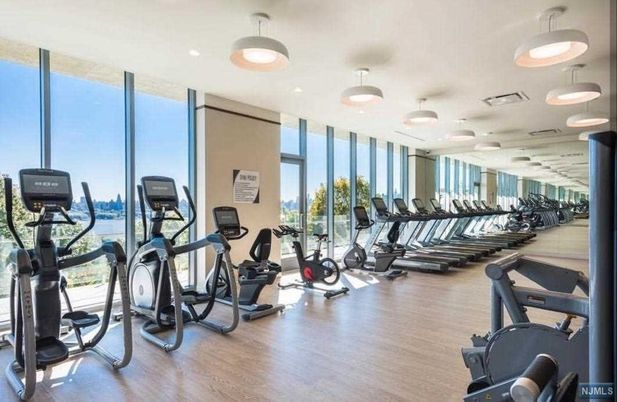 Fitness Equipment, Gym, Interior, Recessed Lighting, Wood Texture Flooring