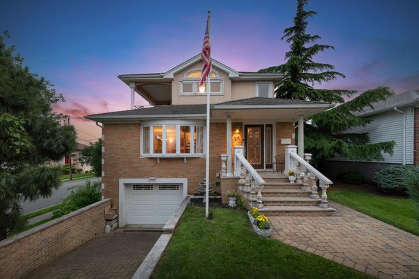 Attached, Exterior, Facade, Brick Facade, American Foursquare