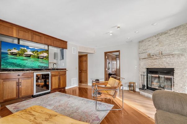 Fireplace, Interior, Recessed Lighting, Stone Walls, Wood Texture Flooring
