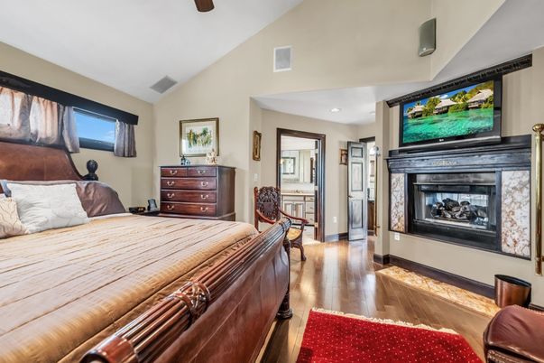 Bedroom, Fireplace, Interior, Recessed Lighting, Wood Texture Flooring