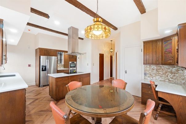 Dining room, Interior, Kitchen, Pendant Lights, Recessed Lighting, Stainless Steel Appliances, Wood Texture Flooring