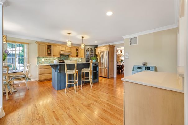 Dining room, Interior, Kitchen, Pendant Lights, Recessed Lighting, Stainless Steel Appliances, Wood Texture Flooring