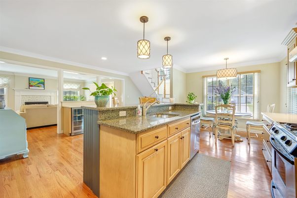 Dining room, Fireplace, Interior, Kitchen, Pendant Lights, Recessed Lighting, Wood Texture Flooring