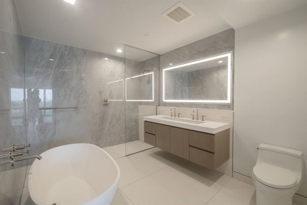 Bathroom, Dual Sink Vanities, Free Standing Baths, Glass Shower, Interior, Marble Walls, Recessed Lighting