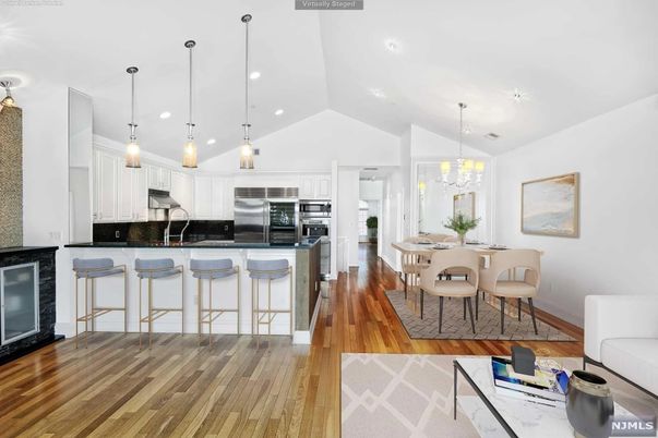 Dining room, Interior, Kitchen, Pendant Lights, Recessed Lighting, Stainless Steel Appliances, Wood Texture Flooring