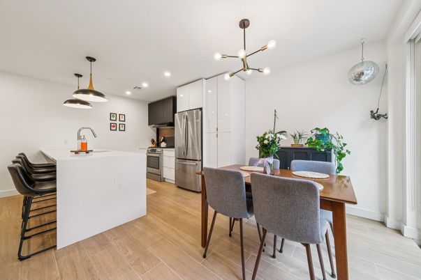 Dining room, Interior, Kitchen, Pendant Lights, Recessed Lighting, Stainless Steel Appliances, Wood Texture Flooring