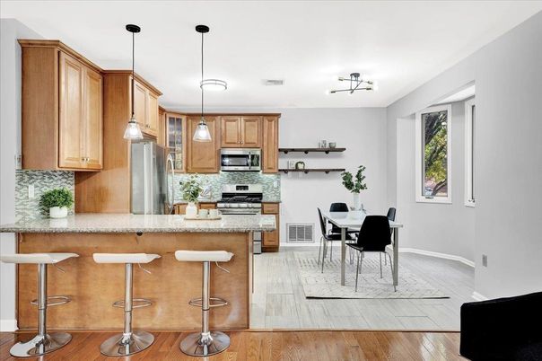 Dining room, Interior, Kitchen, Pendant Lights, Stainless Steel Appliances, Wood Texture Flooring
