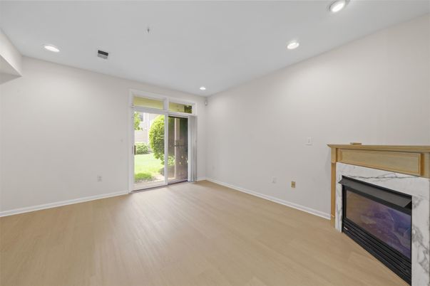 Empty room, Fireplace, Interior, Recessed Lighting, Wood Texture Flooring