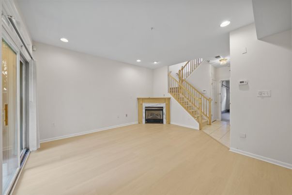 Empty room, Fireplace, Interior, Recessed Lighting, Wood Texture Flooring