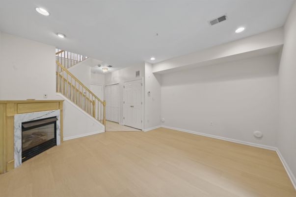 Empty room, Fireplace, Interior, Recessed Lighting, Wood Texture Flooring
