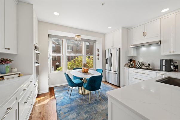 Dining room, Interior, Kitchen, Recessed Lighting, Stainless Steel Appliances, Wood Texture Flooring