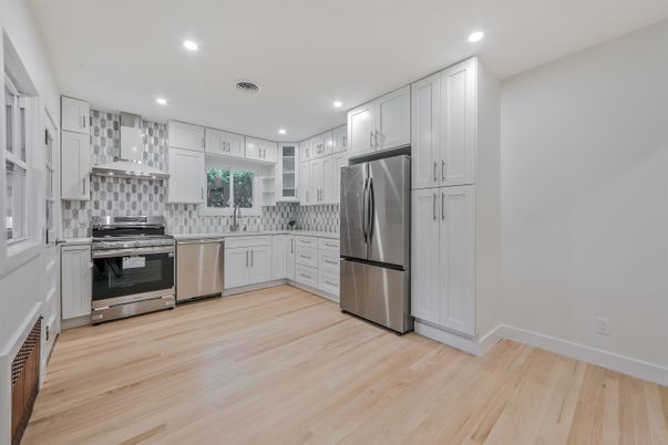 Interior, Kitchen, Recessed Lighting, Stainless Steel Appliances, Wood Texture Flooring