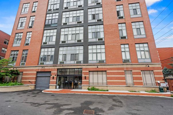 Exterior, Facade, Brick Facade, Condo Building