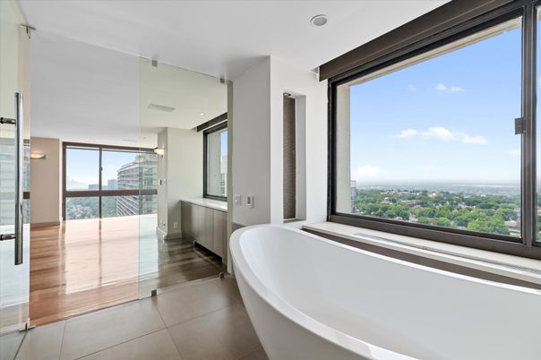 Bathroom, Free Standing Baths, Glass Shower, Interior, Recessed Lighting, Wood Texture Flooring
