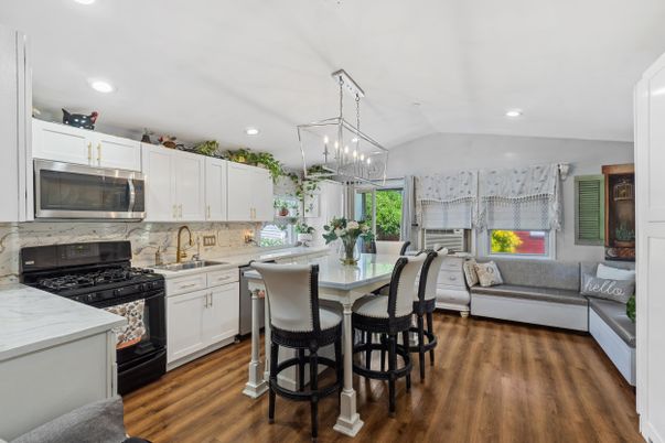 Dining room, Interior, Kitchen, Living room, Marble Walls, Pendant Lights, Recessed Lighting, Wood Texture Flooring