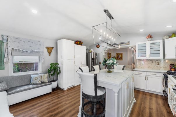Interior, Kitchen, Marble Walls, Pendant Lights, Recessed Lighting, Stainless Steel Appliances, Wood Texture Flooring