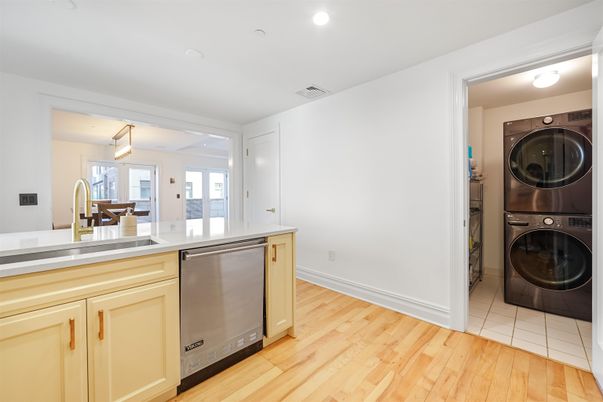 Dining room, Interior, Kitchen, Recessed Lighting, Washer, Wood Texture Flooring