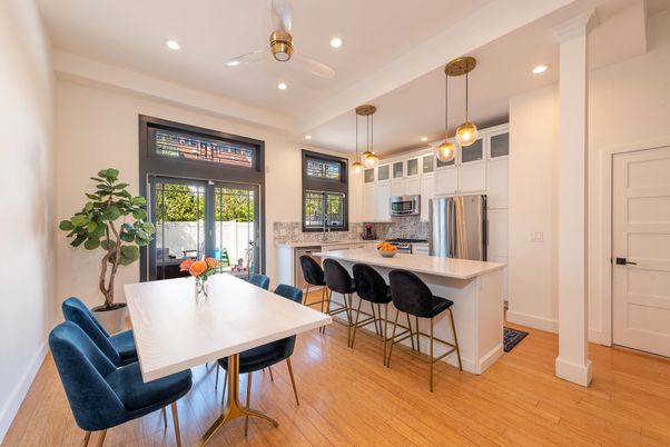 Dining room, Interior, Kitchen, Pendant Lights, Recessed Lighting, Stainless Steel Appliances, Wood Texture Flooring